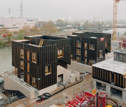 Athletendorf wird zu Stadtviertel außerhalb von Paris