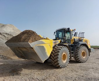 Kuhn Radlader Bagger und Lader